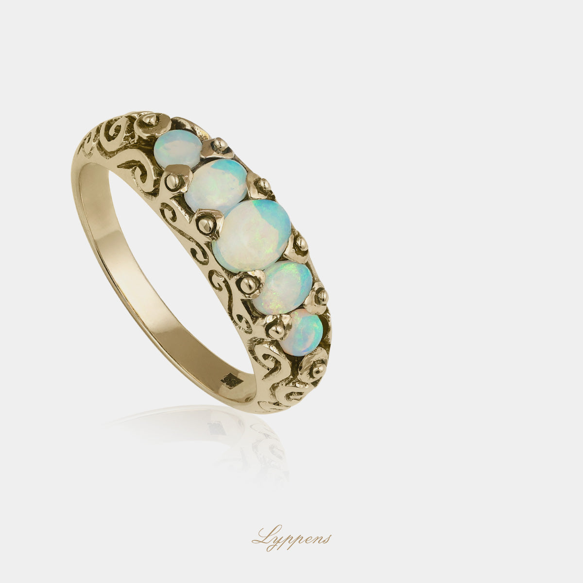 Yellow gold five stone ring with opal