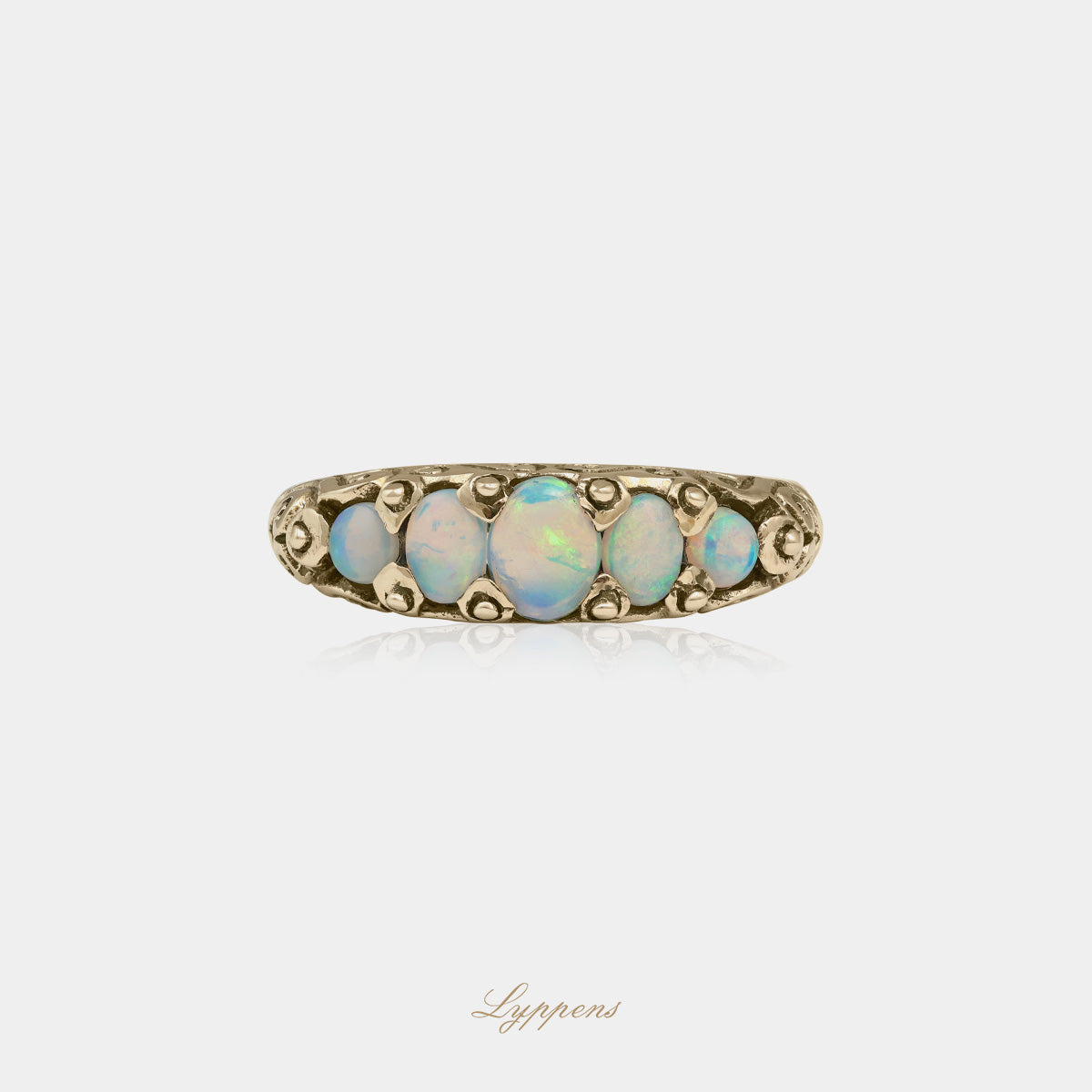 Yellow gold five stone ring with opal