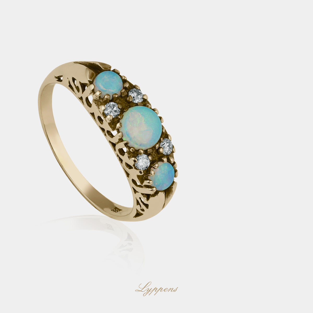 Yellow gold ring with opal and diamonds