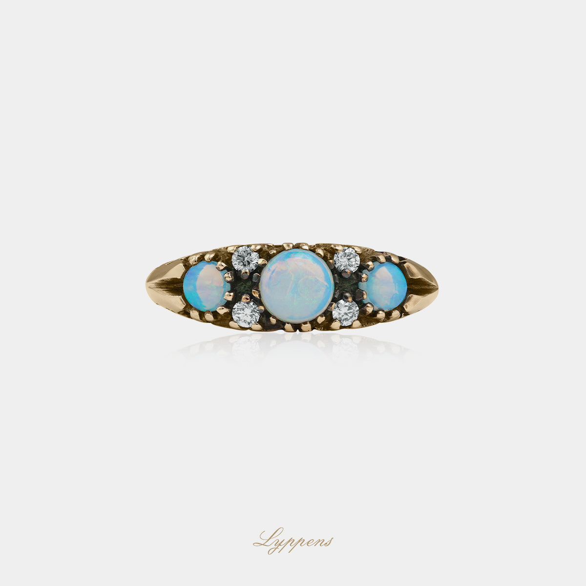 Yellow gold ring with opal and diamonds