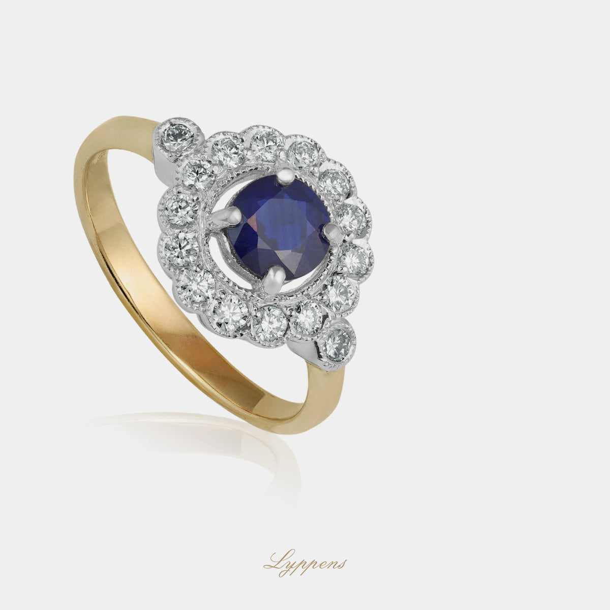 Yellow and white gold ring with sapphire and diamonds