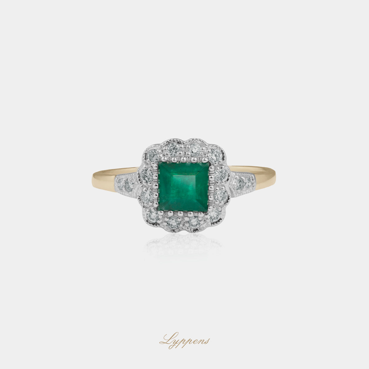 Yellow and white gold ring with emerald and diamonds