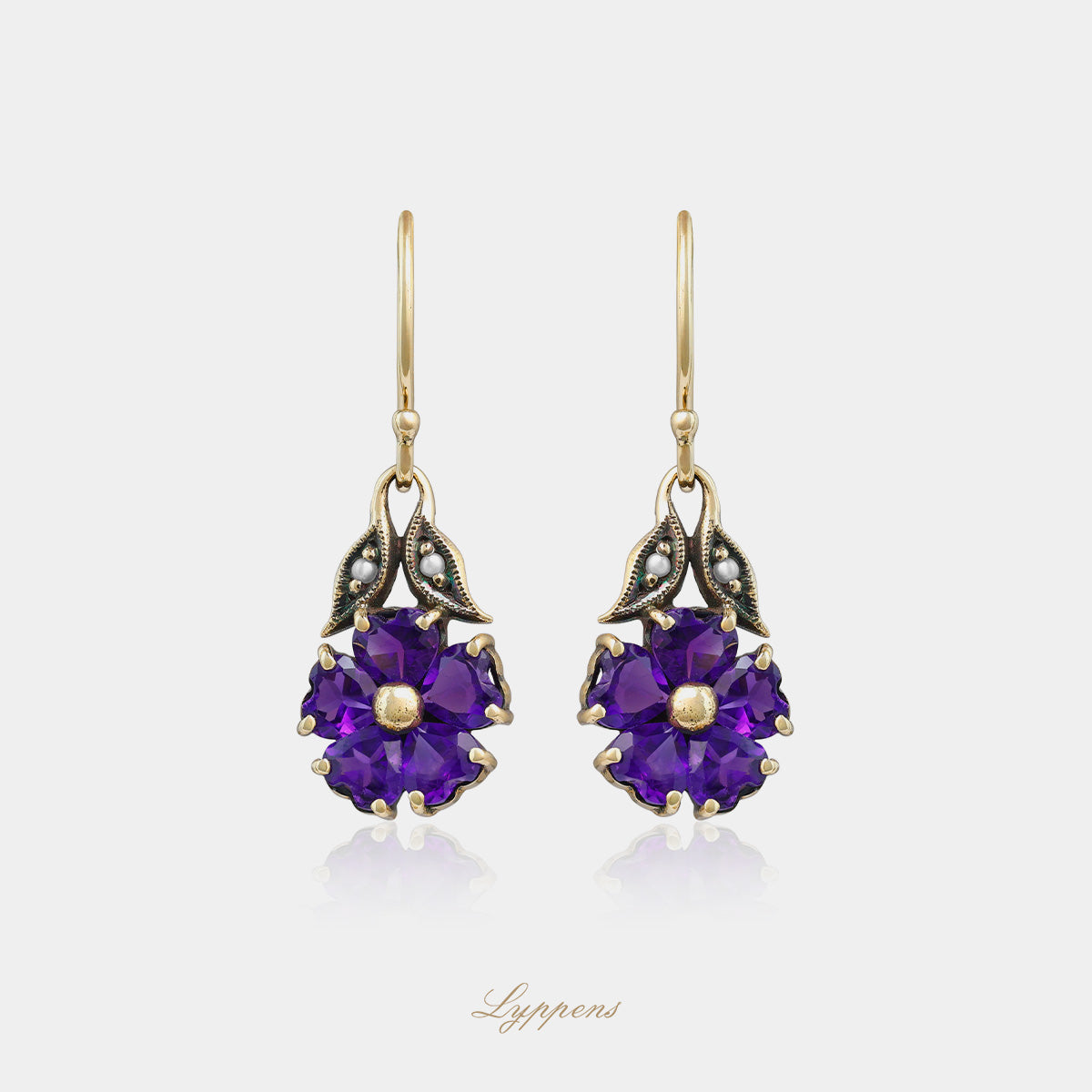 Yellow gold earrings with amethyst and pearls