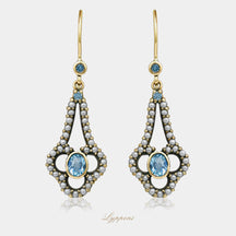 Yellow gold with pearl and topaz