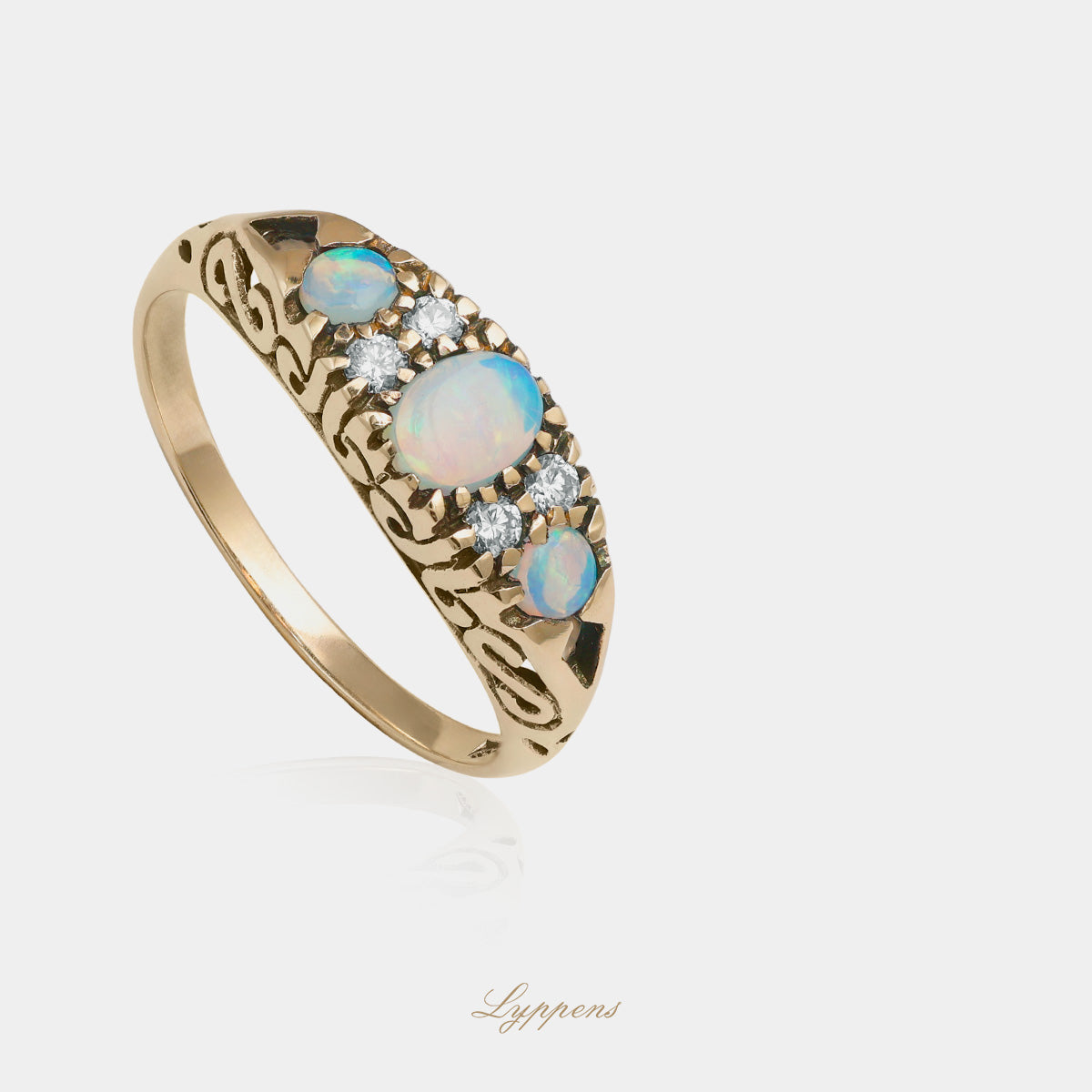 Yellow gold ring with opal and diamonds