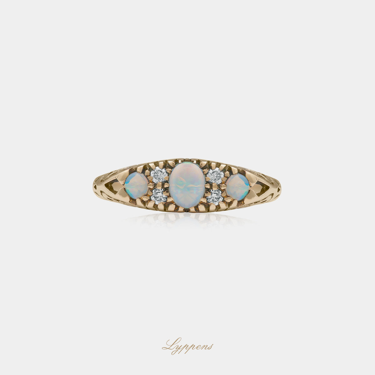 Yellow gold ring with opal and diamonds