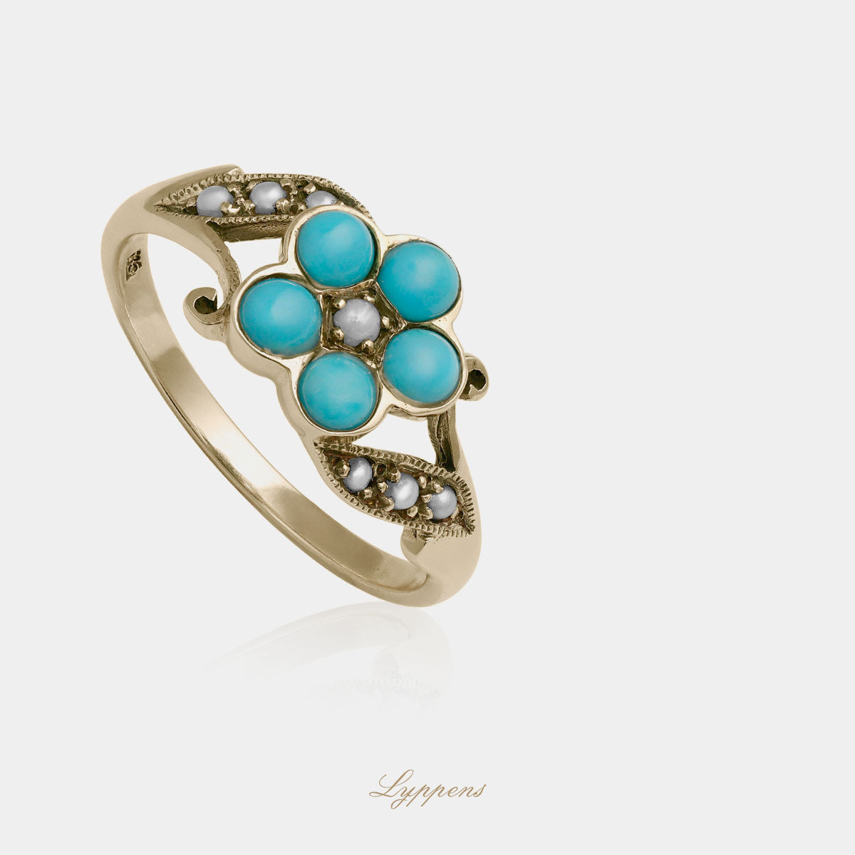 Yellow gold ring with turquoise and pearls