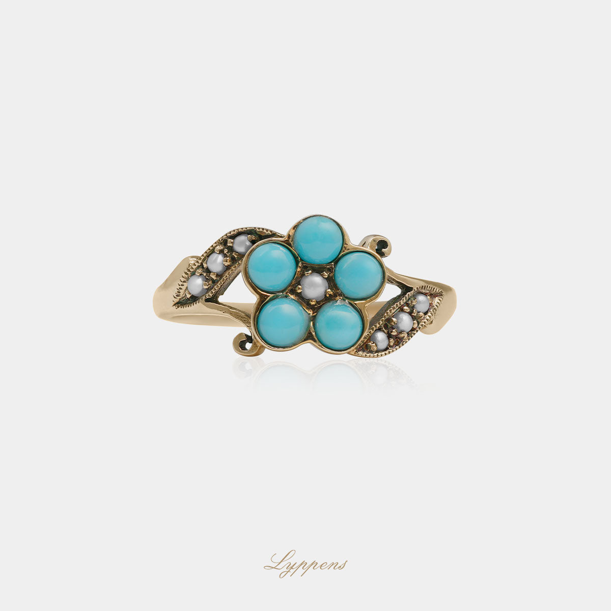 Yellow gold ring with turquoise and pearls