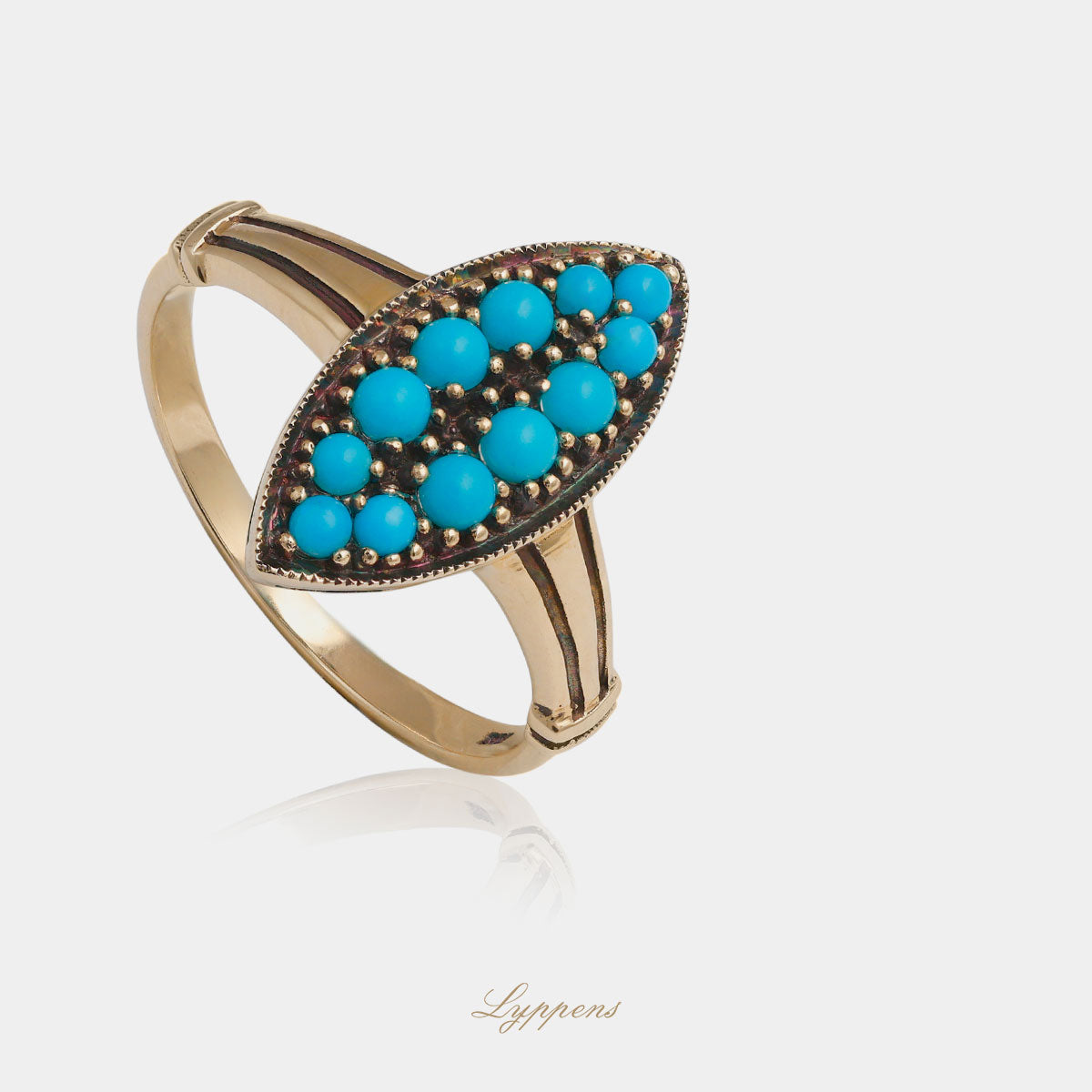 Yellow gold ring with turquoise