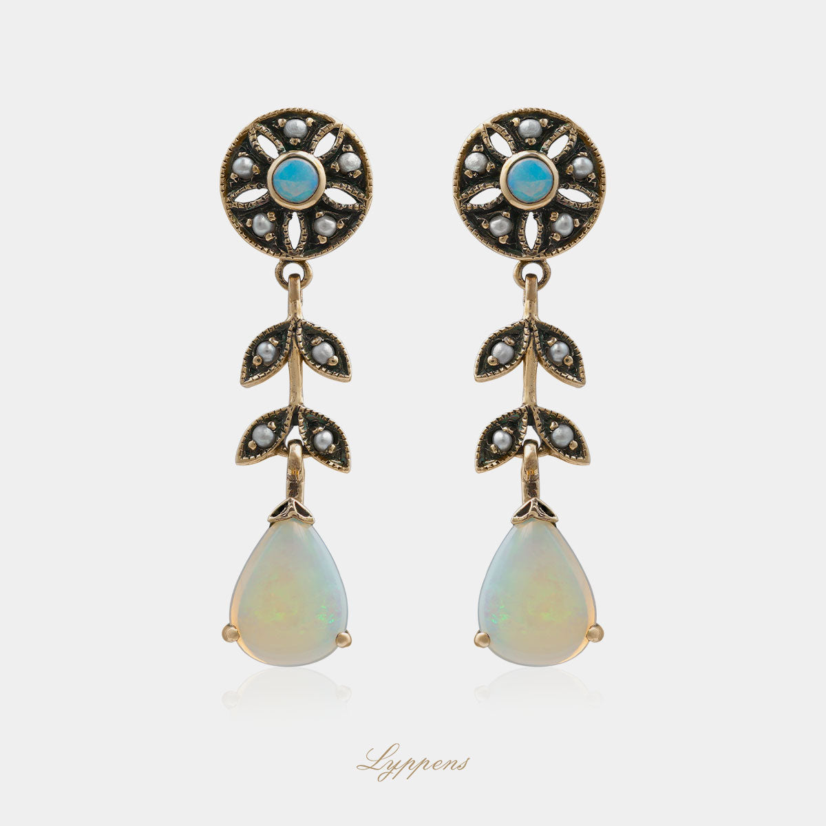 Yellow gold earrings with opal and pearls