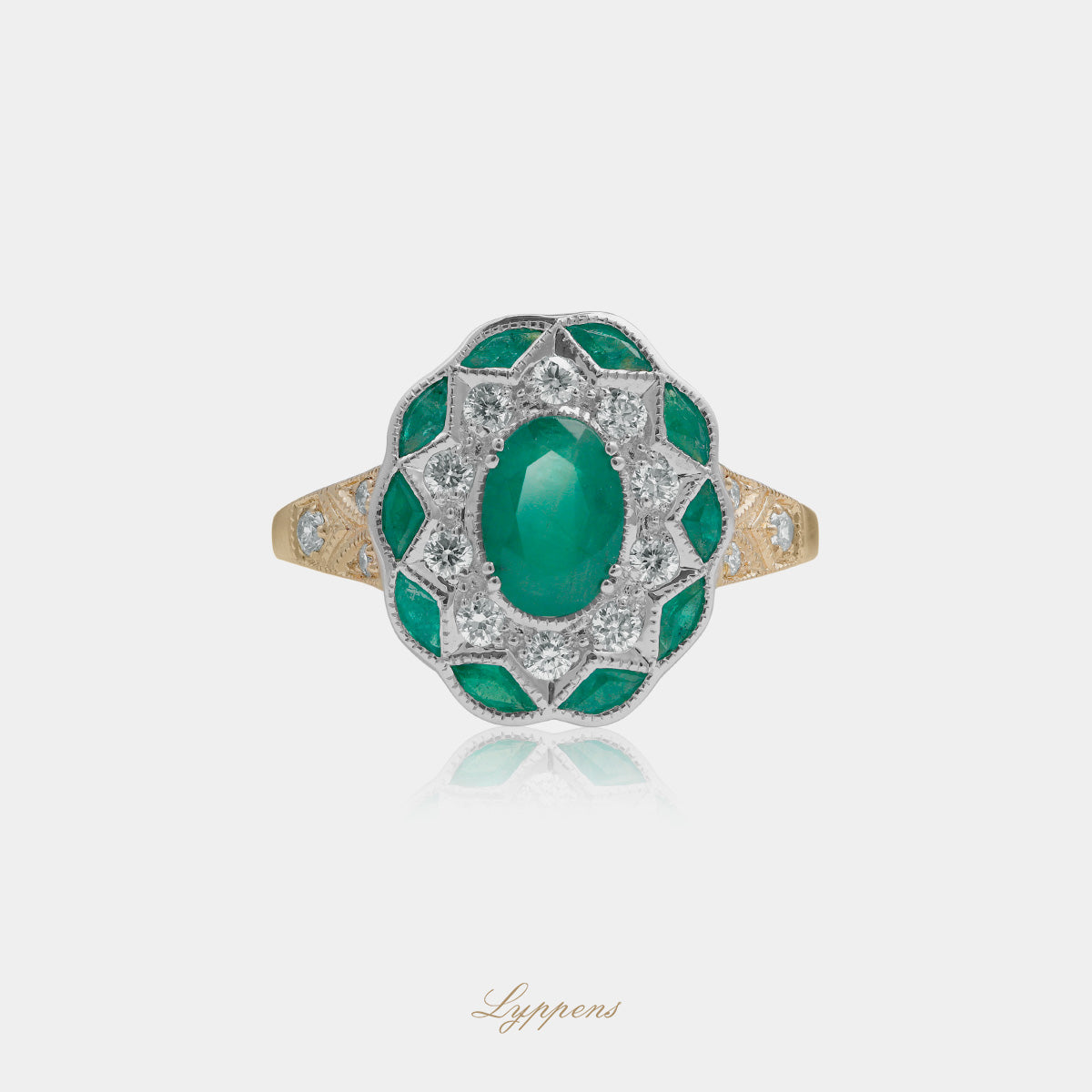 Yellow gold ring with emerald and diamonds