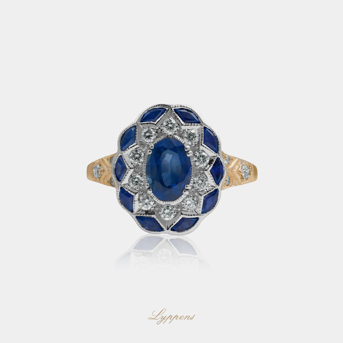 Yellow gold ring with sapphire and diamonds