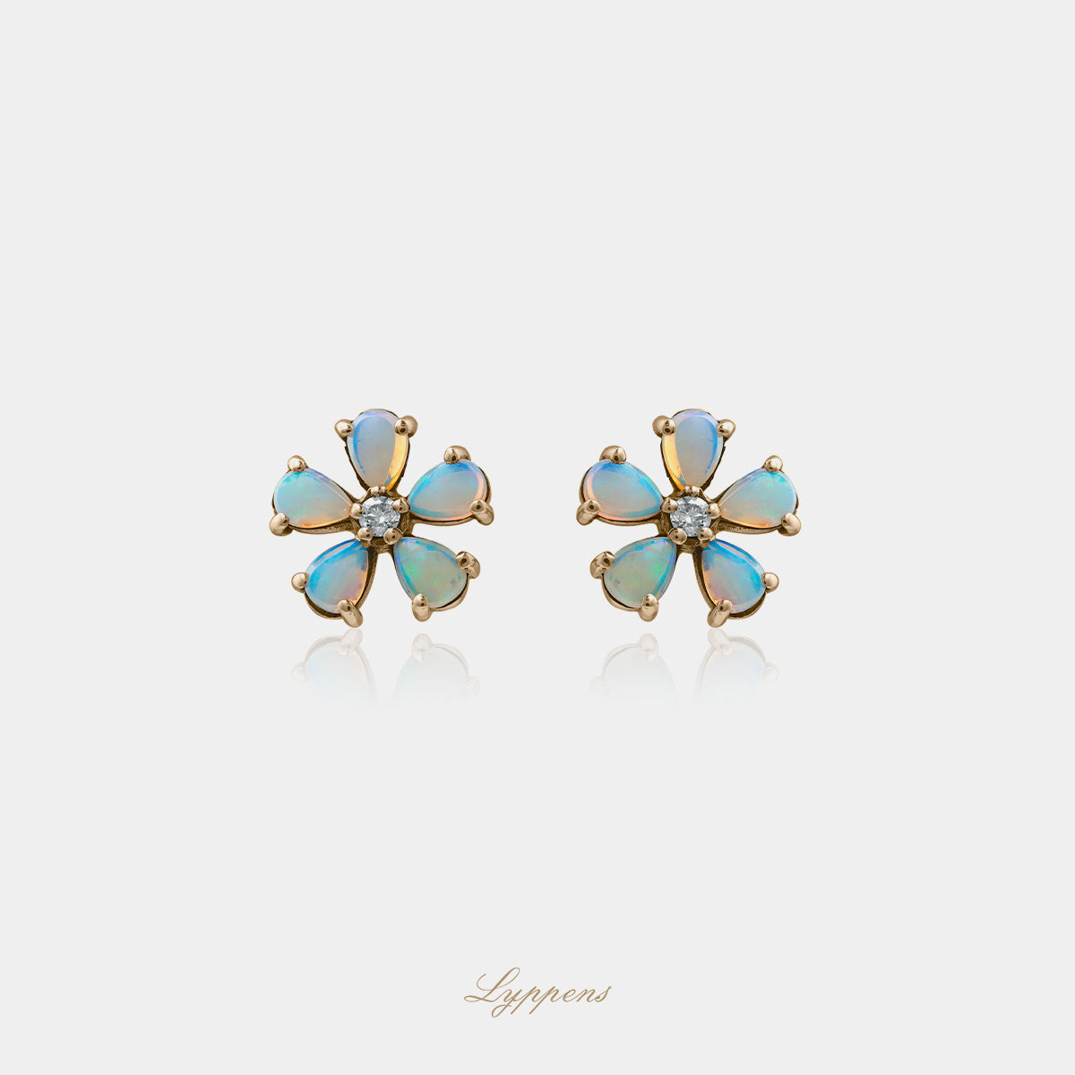 Yellow gold ear studs with opal and diamonds