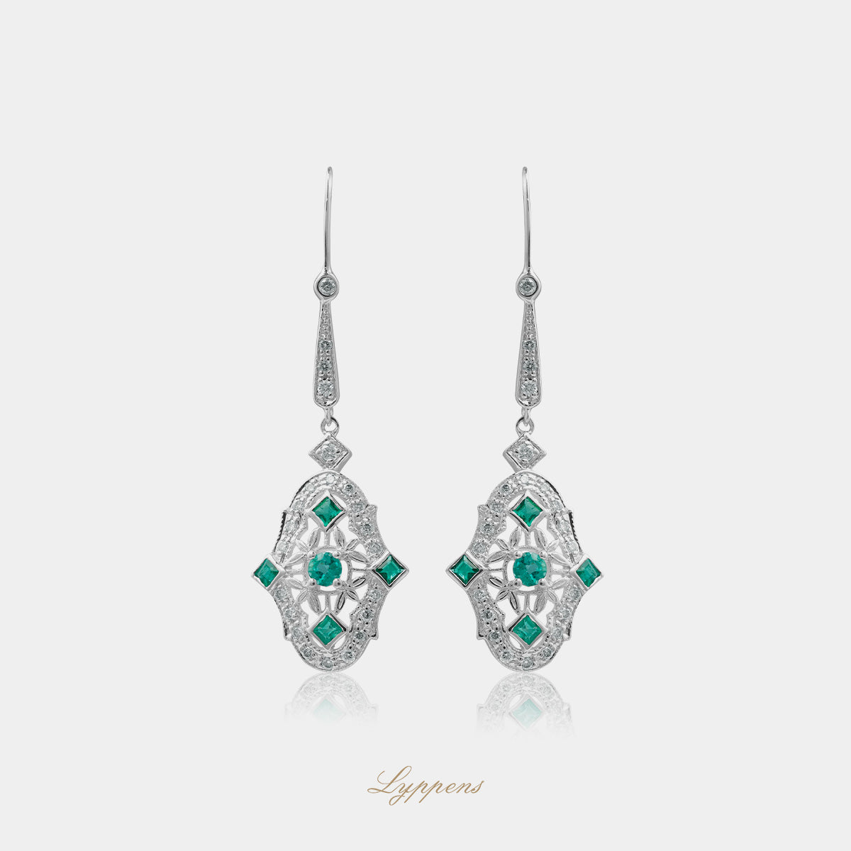 White gold drop earrings with emerald and diamonds