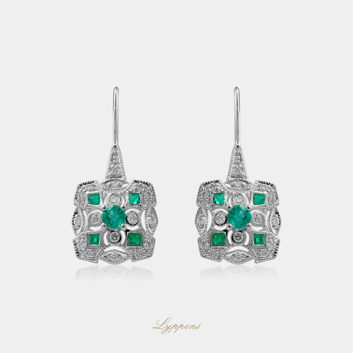 White gold earrings with emerald and diamonds