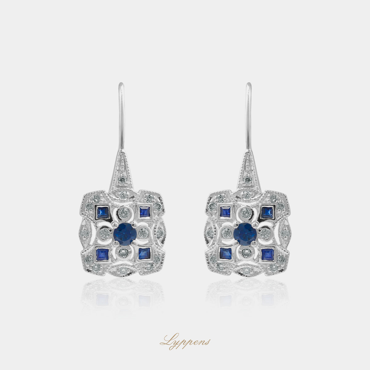 White gold drop earrings with sapphire and diamonds