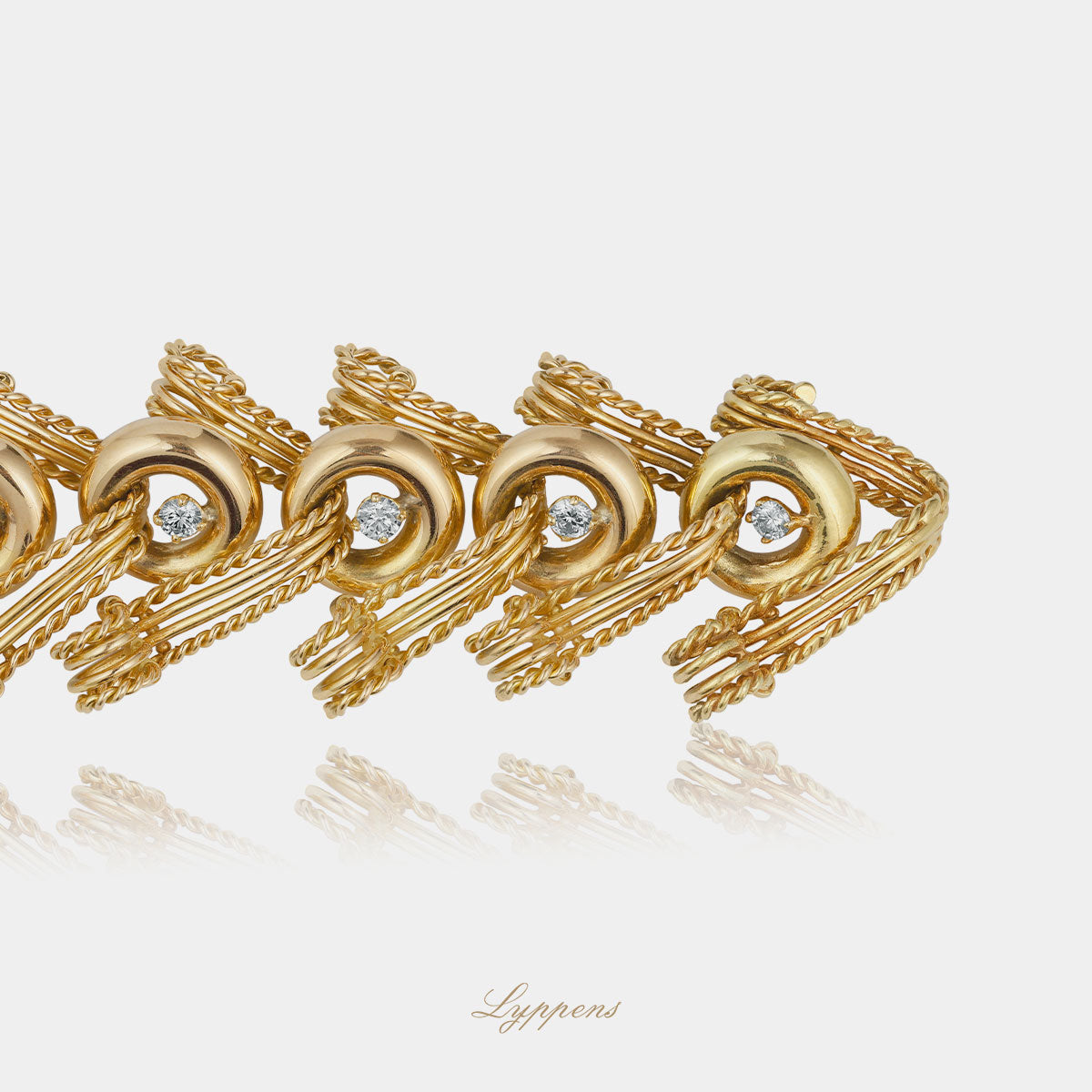 Yellow gold 1950s bracelet with diamonds