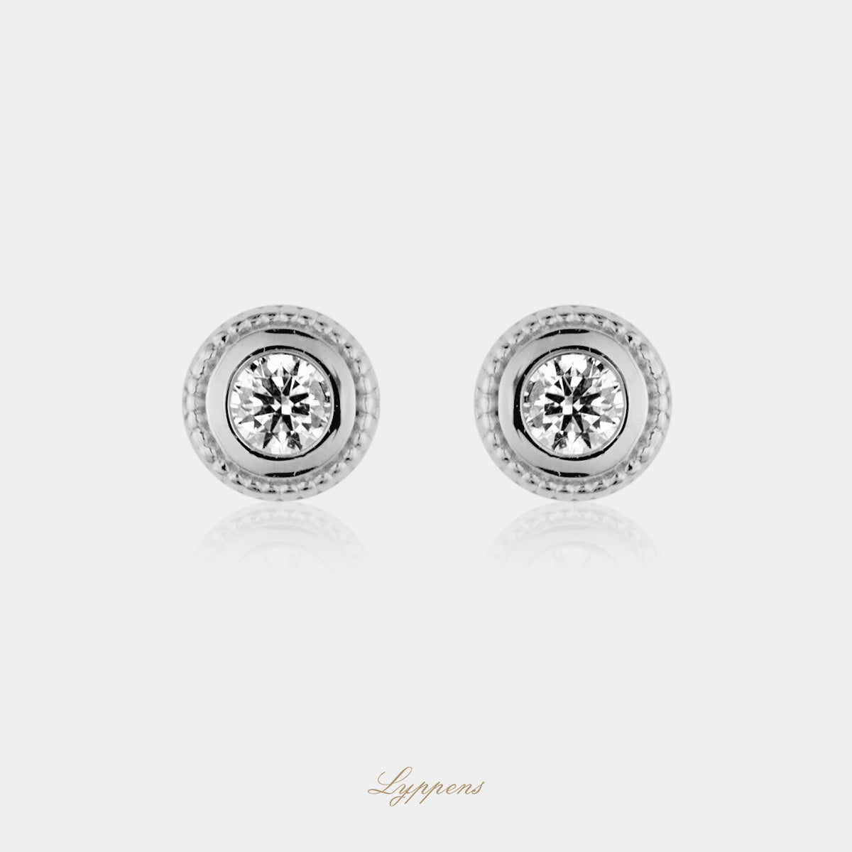 White gold ear studs with diamonds