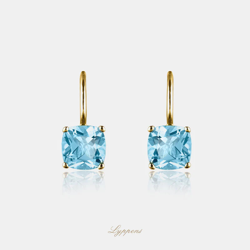 Yellow gold earrings with topaz