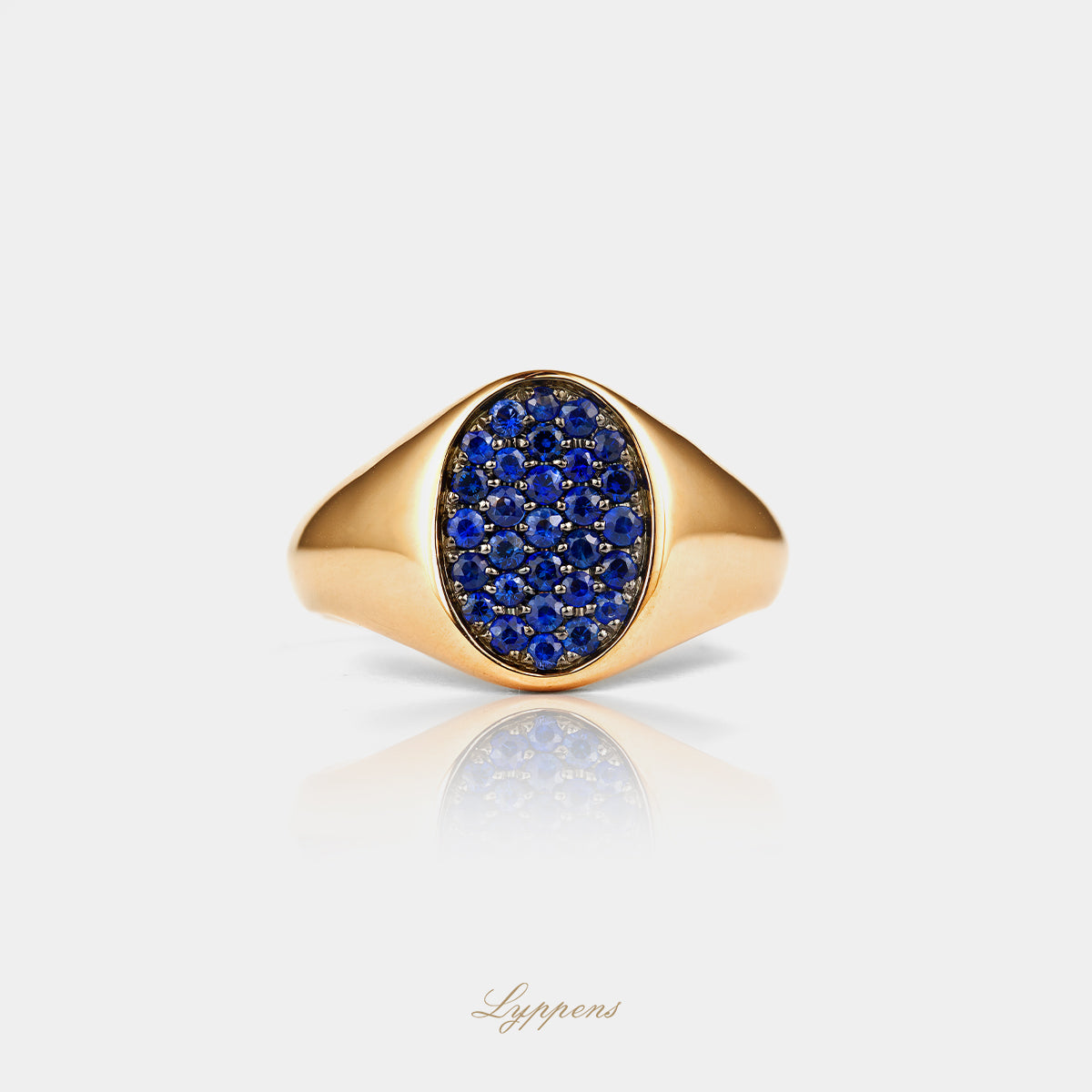 Yellow gold signet ring with sapphire