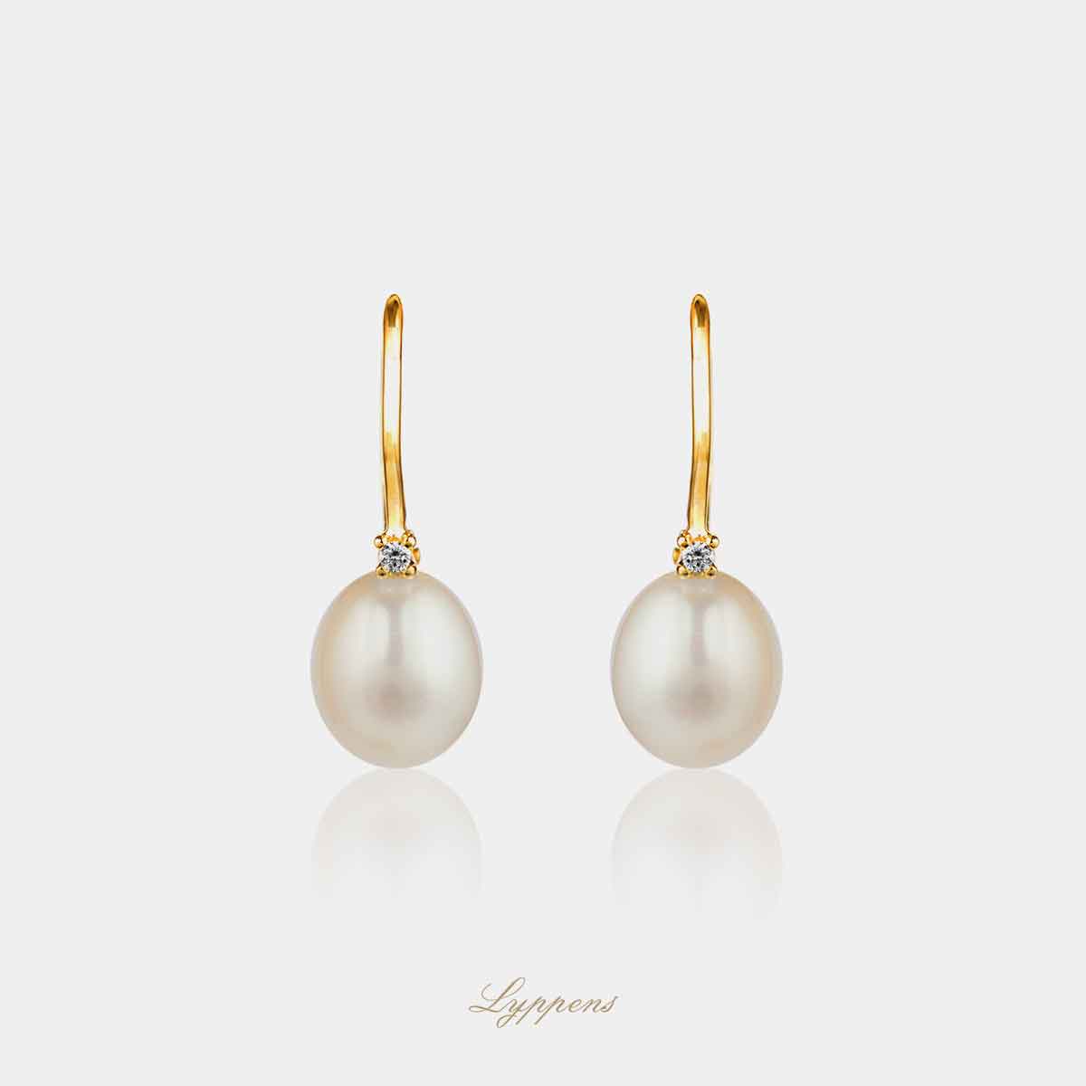 Yellow gold earrings with pearl and diamond