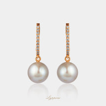 Geelgoud met diamant en grijze parel