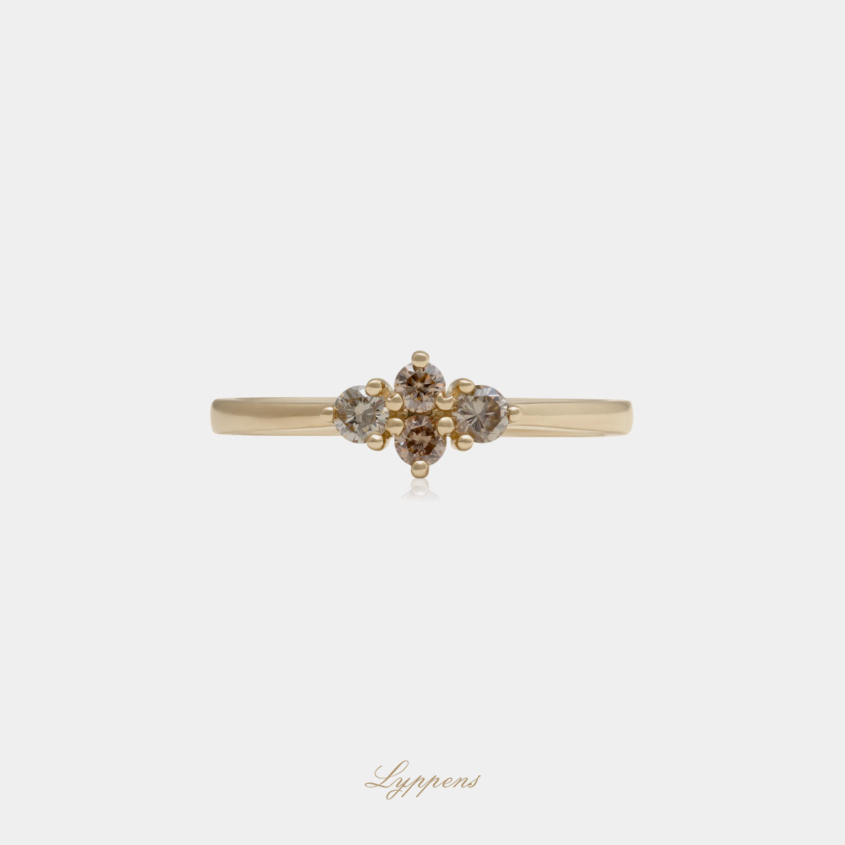 Yellow gold ring with brown diamonds