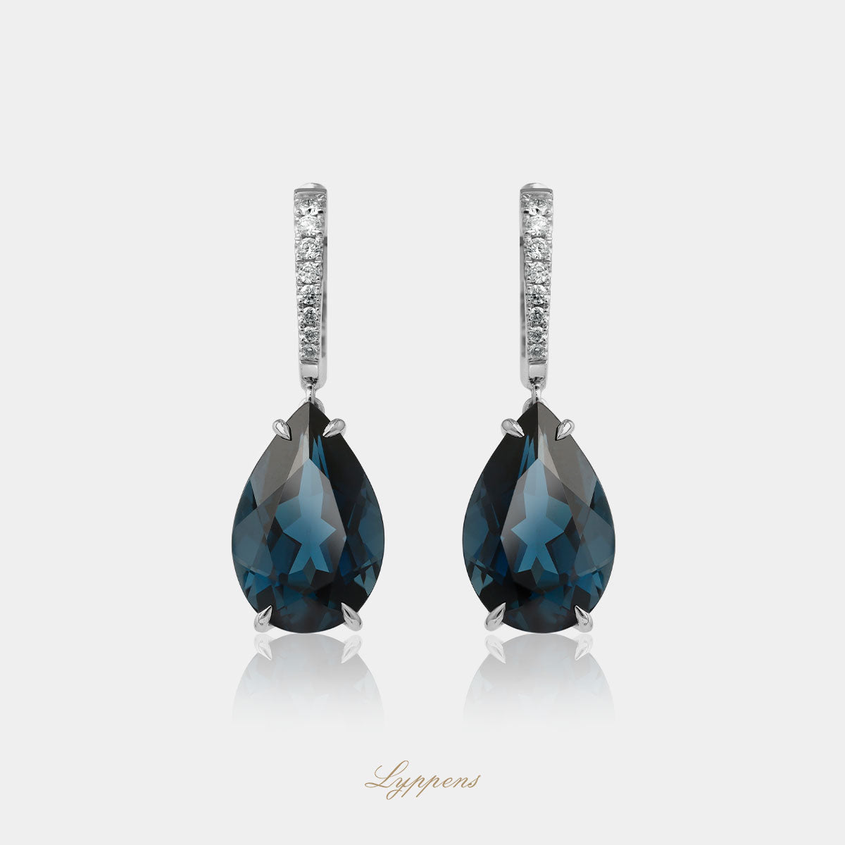 White gold earrings with topaz and diamonds