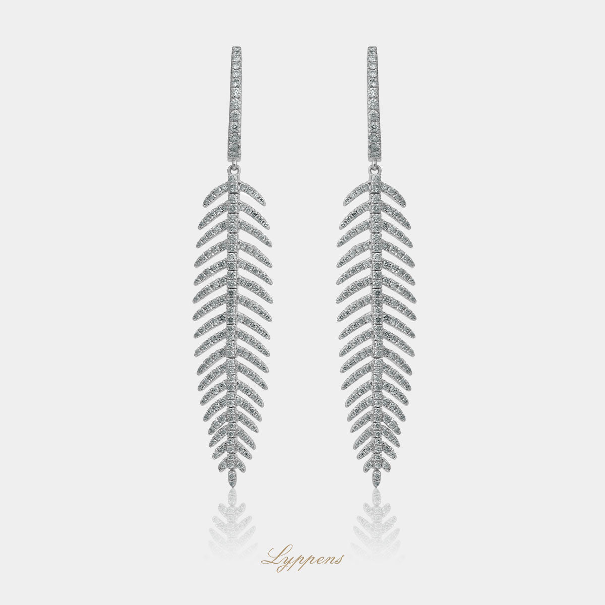 White gold feather earrings with diamonds