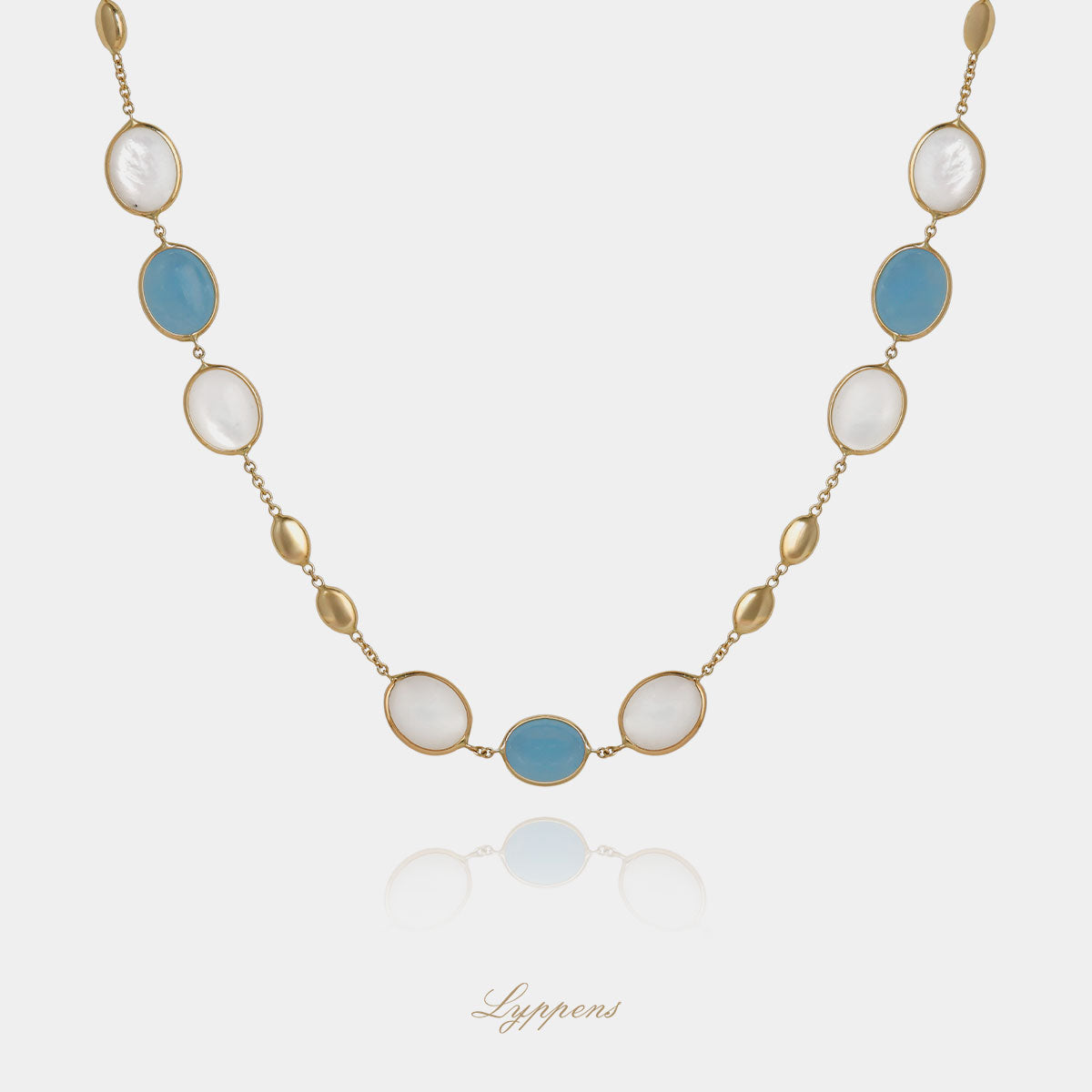 Yellow gold necklace with aquamarine and mother of pearl