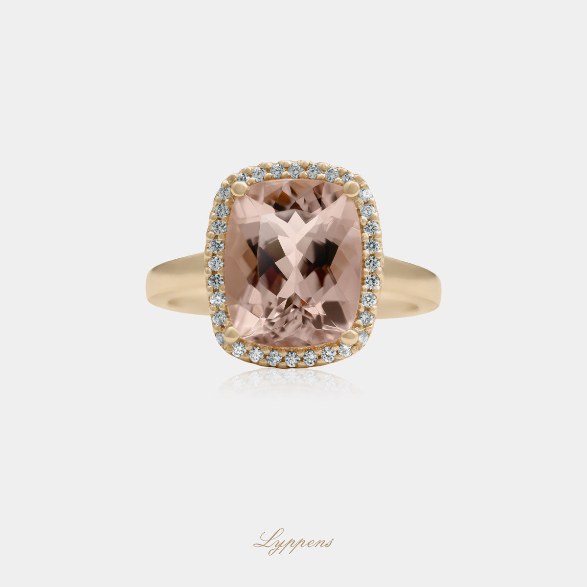 Yellow gold halo ring with morganite and diamonds