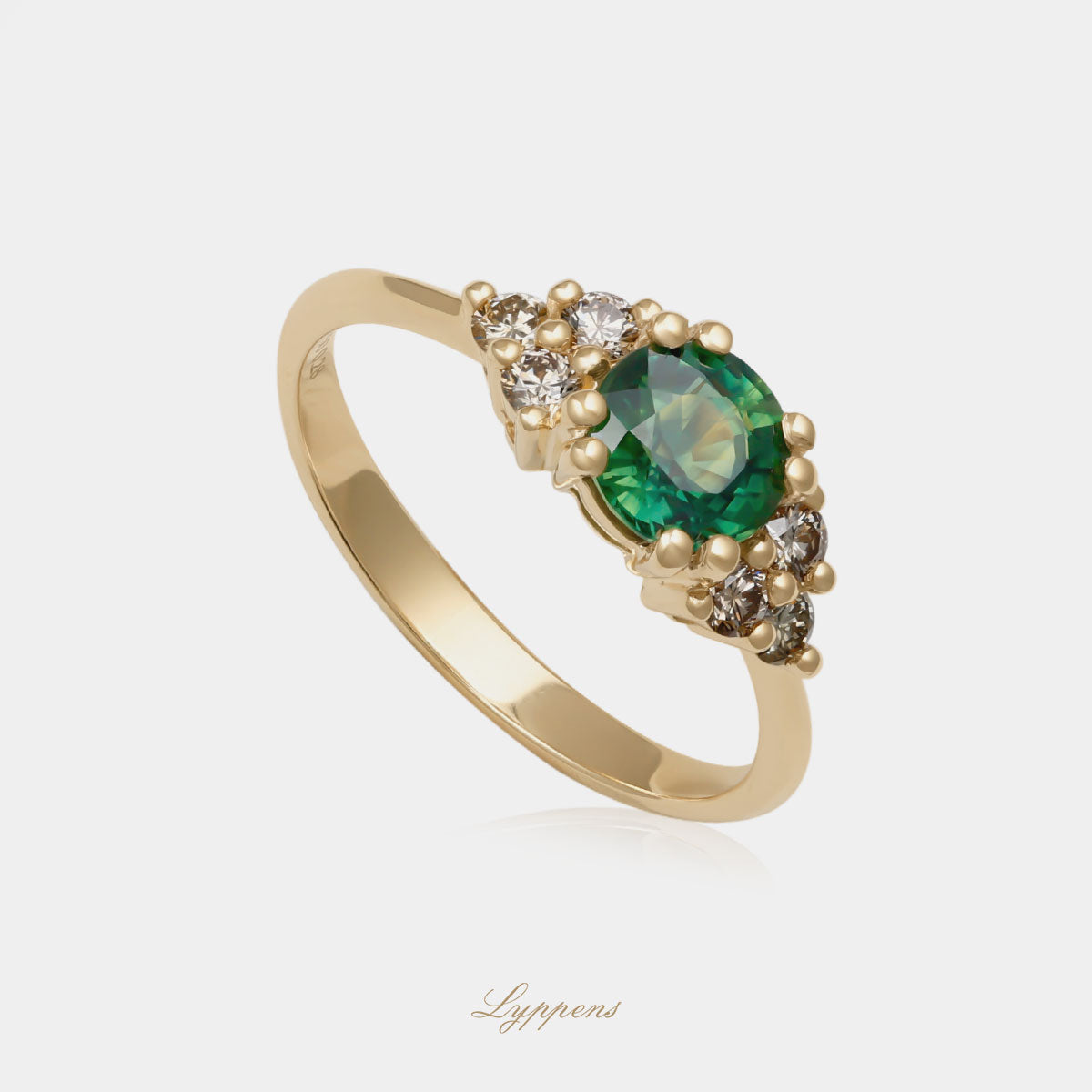 Geelgouden ring met groene saffier en bruine diamant
