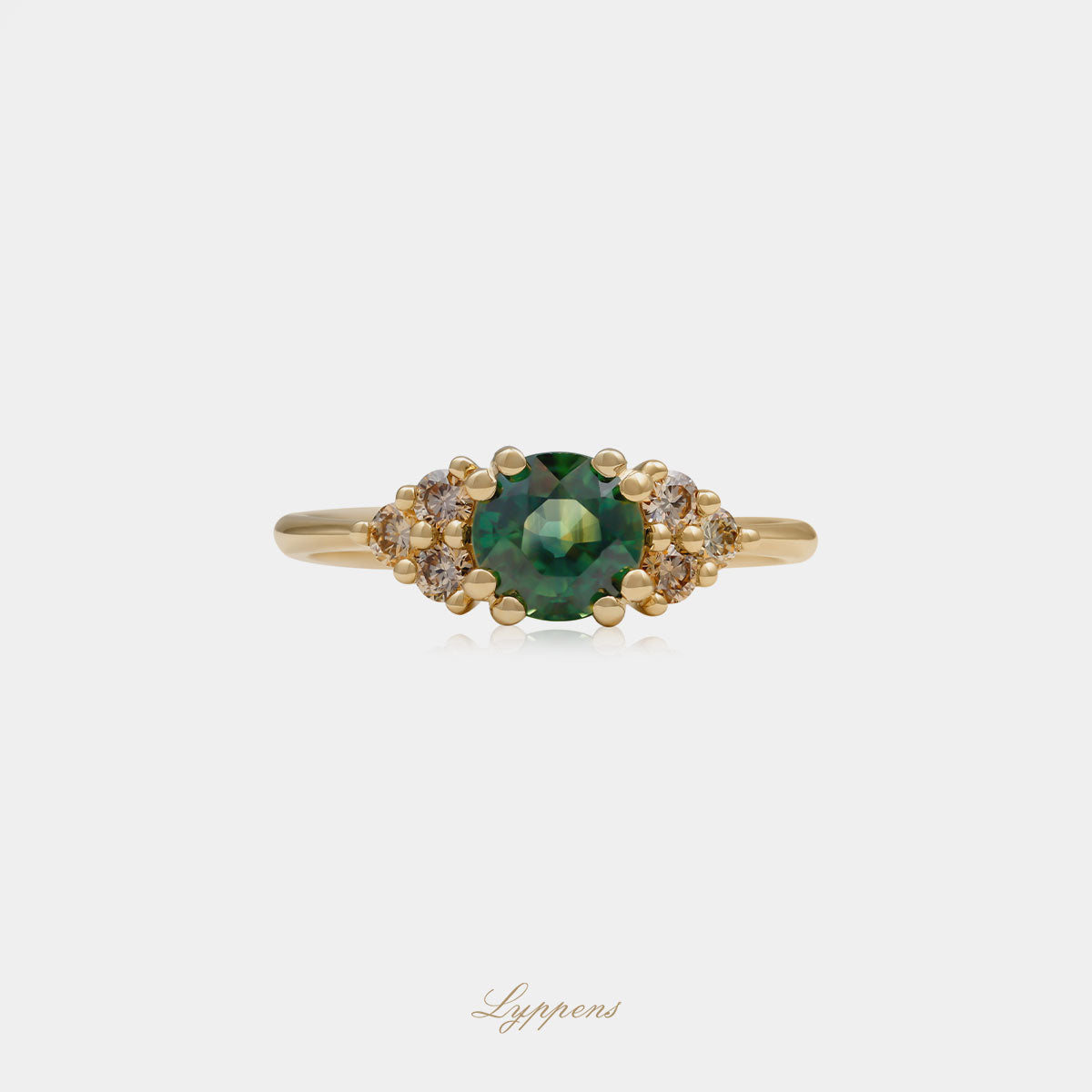 Geelgouden ring met groene saffier en bruine diamant