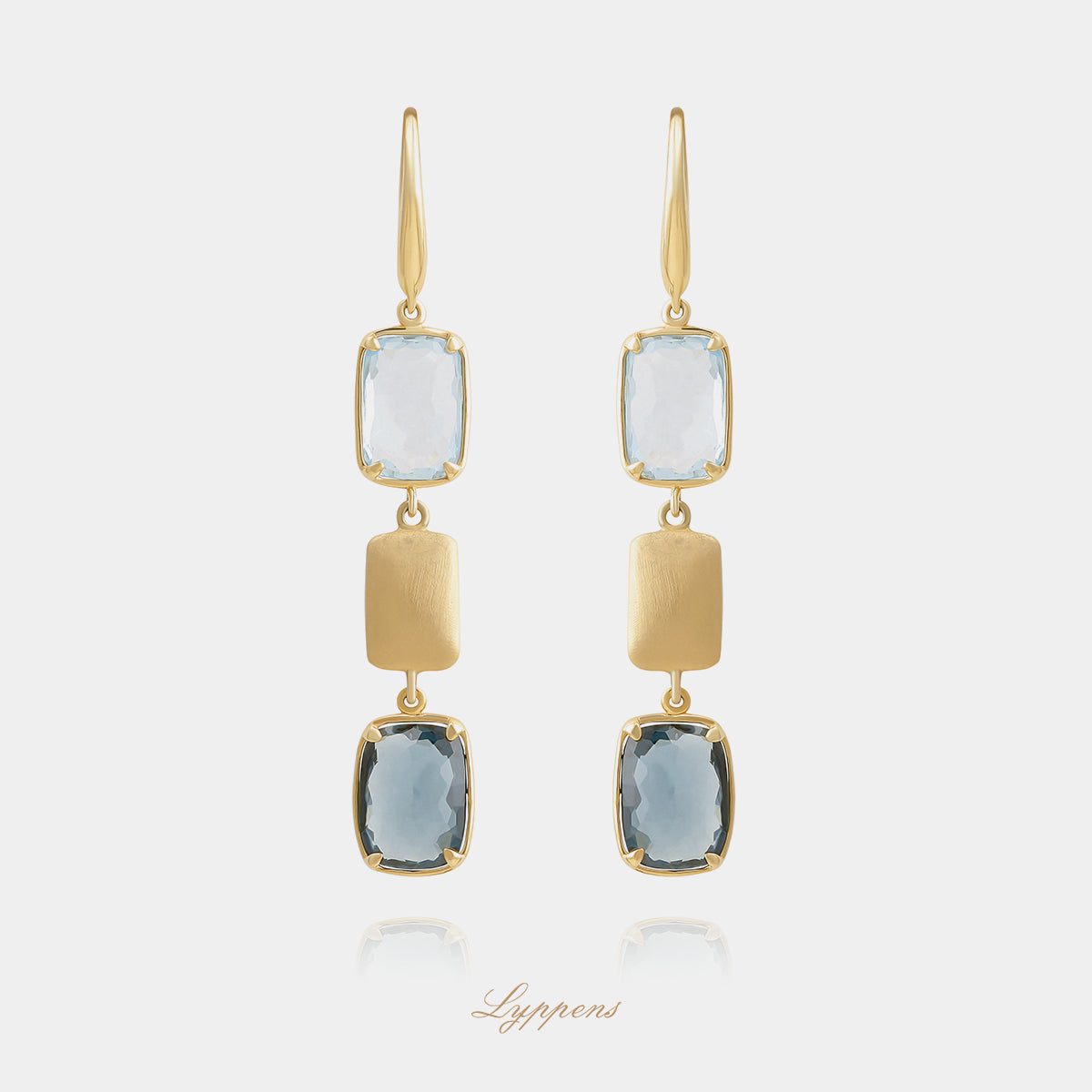 Yellow gold earrings with topaz
