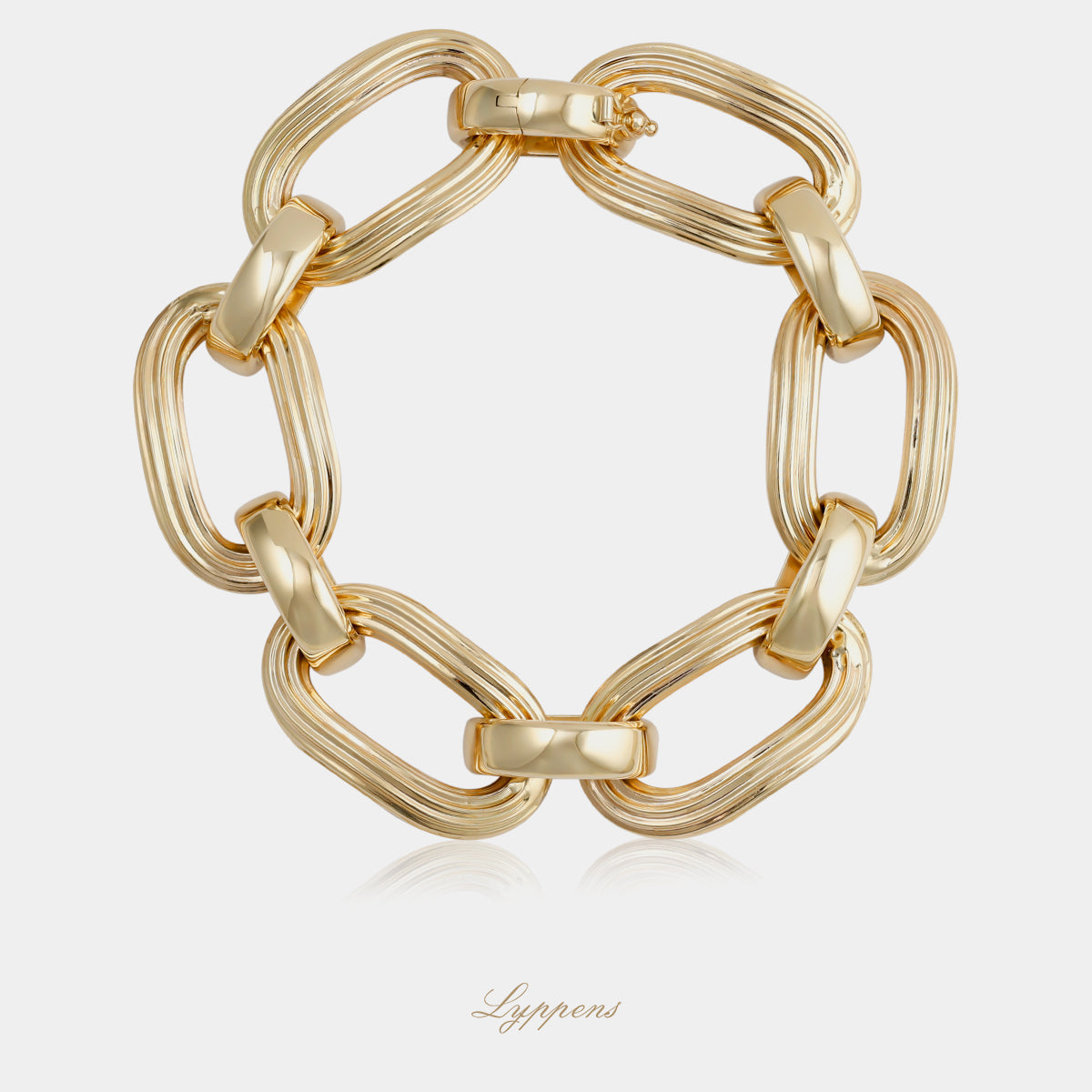 14kt geelgouden fantasie schakelarmband met geribbelde ovale schakels en half ronde schakels