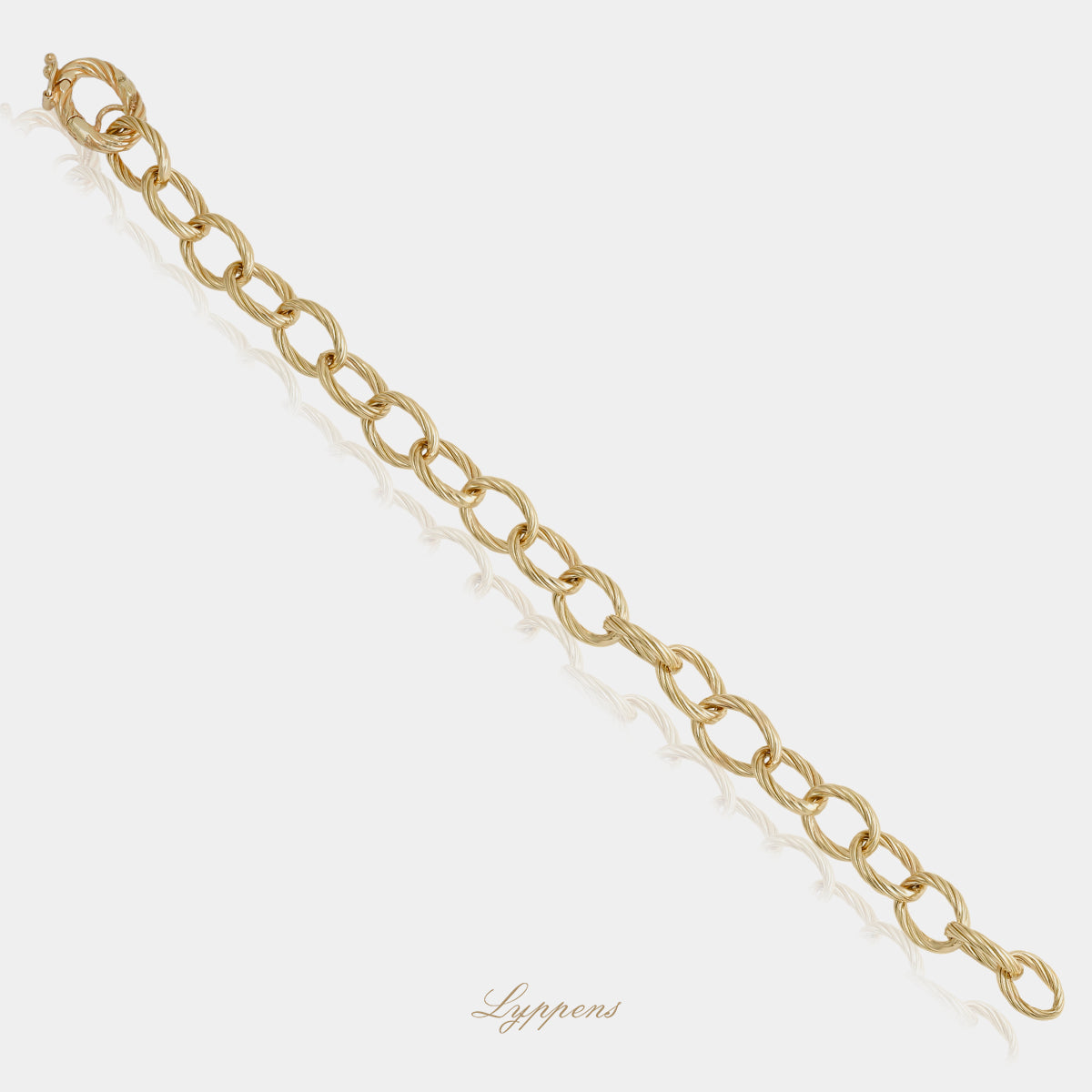 14kt geelgouden armband met fantasie schakels in getorst ovaal design