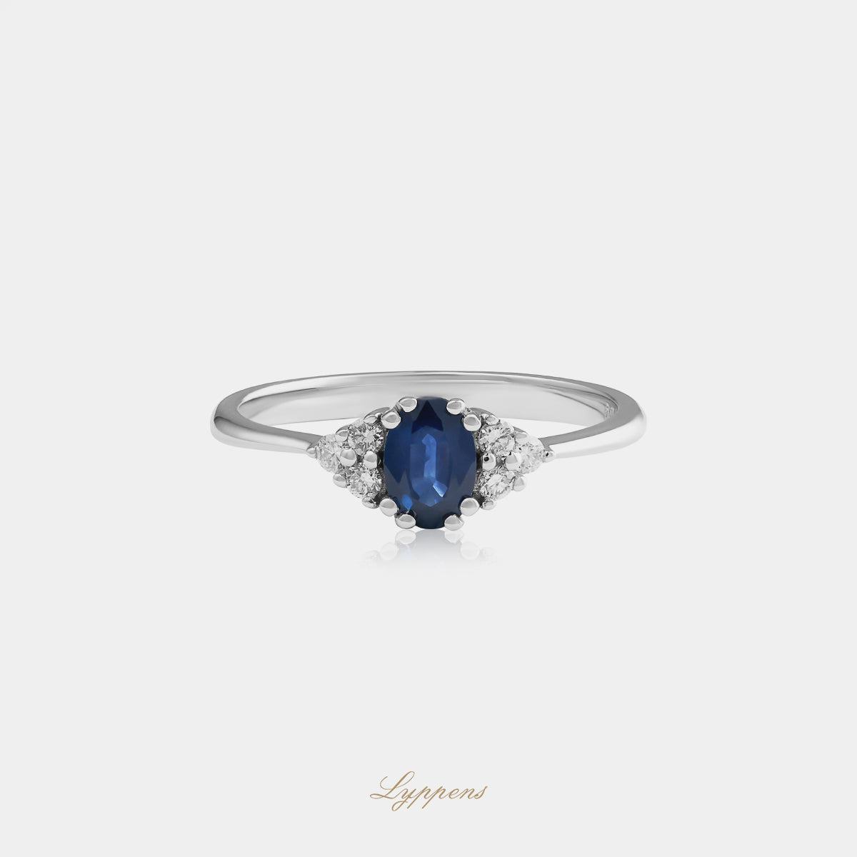 18kt witgouden ring met ovaal geslepen saffier en 0.12ct briljant geslepen diamanten