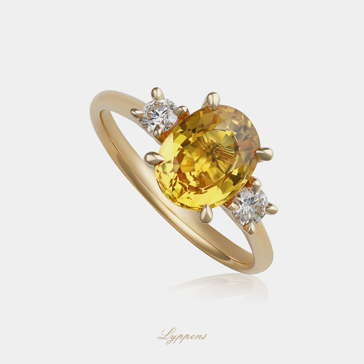 18kt geelgouden verlovingsring met gele saffier en briljant geslepen diamanten zijstenen