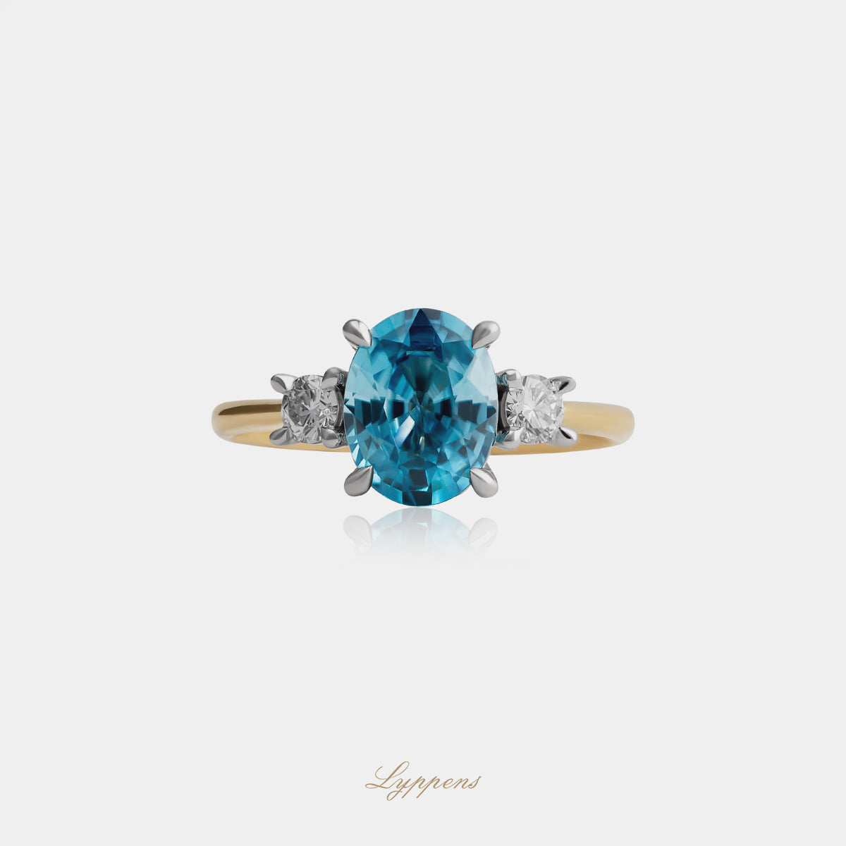 18kt geel- en witgouden ring met ovaal geslepen zirkoon en briljant diamant 0.24ct G SI1