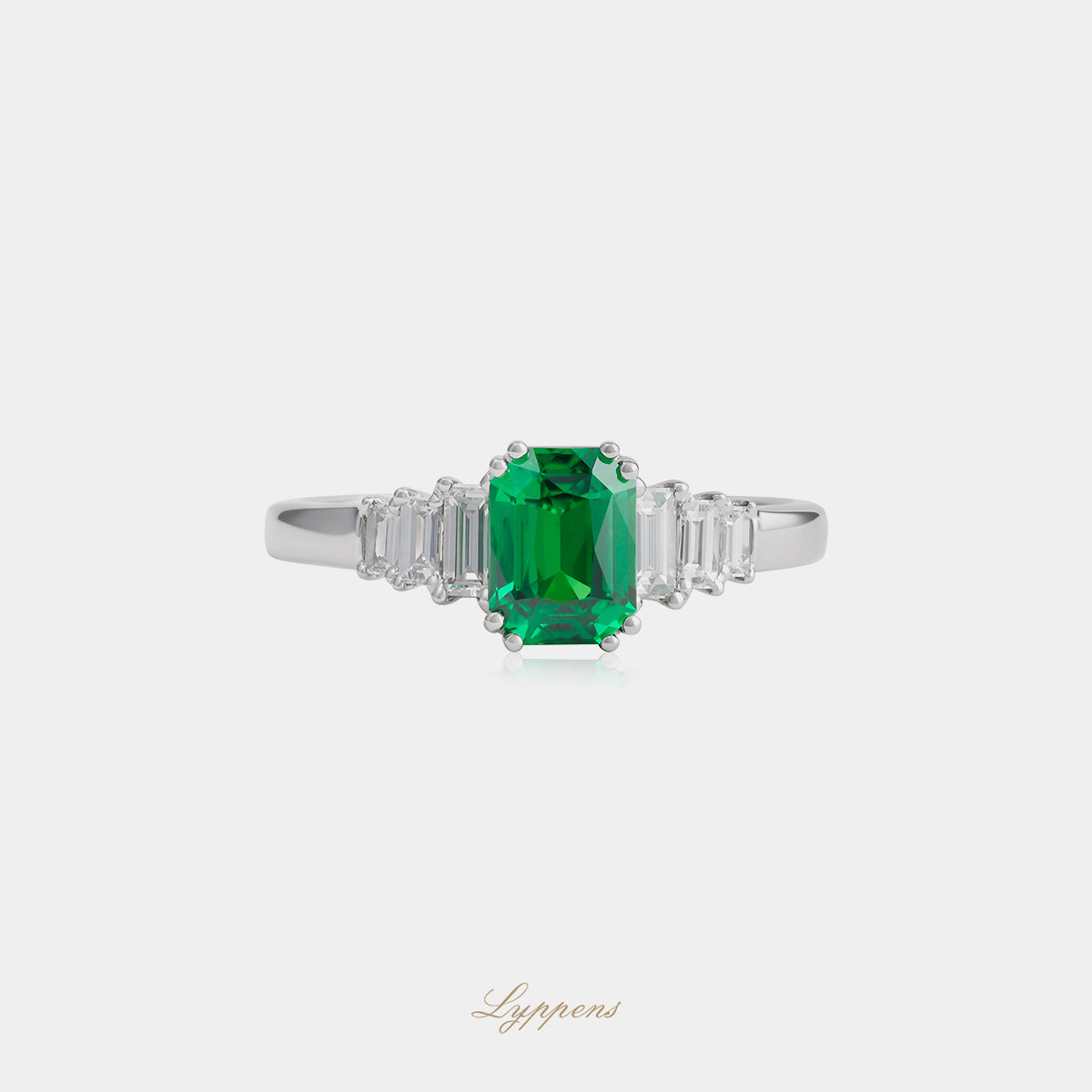 18kt witgouden ring met rechthoekige tsavoriet en baguette diamant 0.32ct F VS1