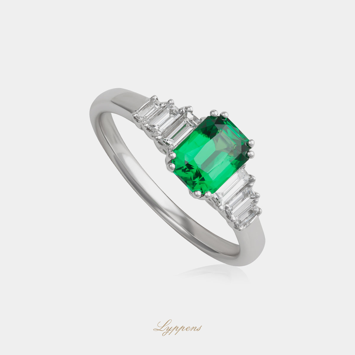 18 karaat witgouden ring met tsavoriet en baguette geslepen diamant 0.32ct F VS1