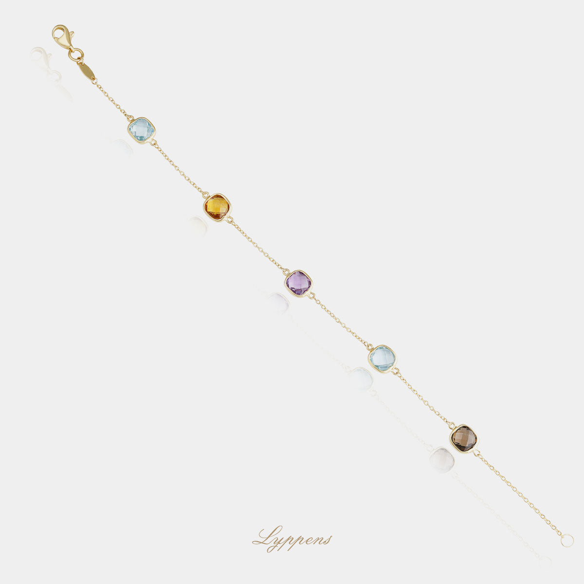 Yellow gold bracelet featuring citrine, amethyst, smoky quartz and topaz