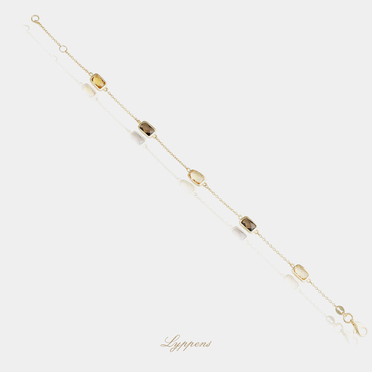 Geelgouden armband met citrien en rookkwarts