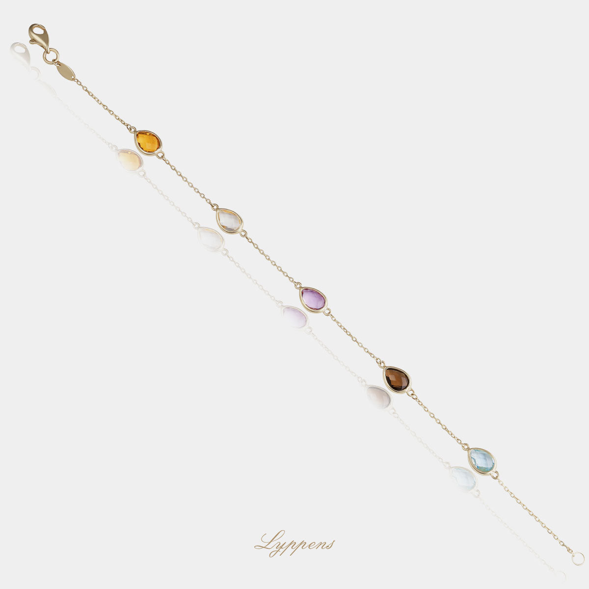 Yellow gold bracelet featuring various gemstones