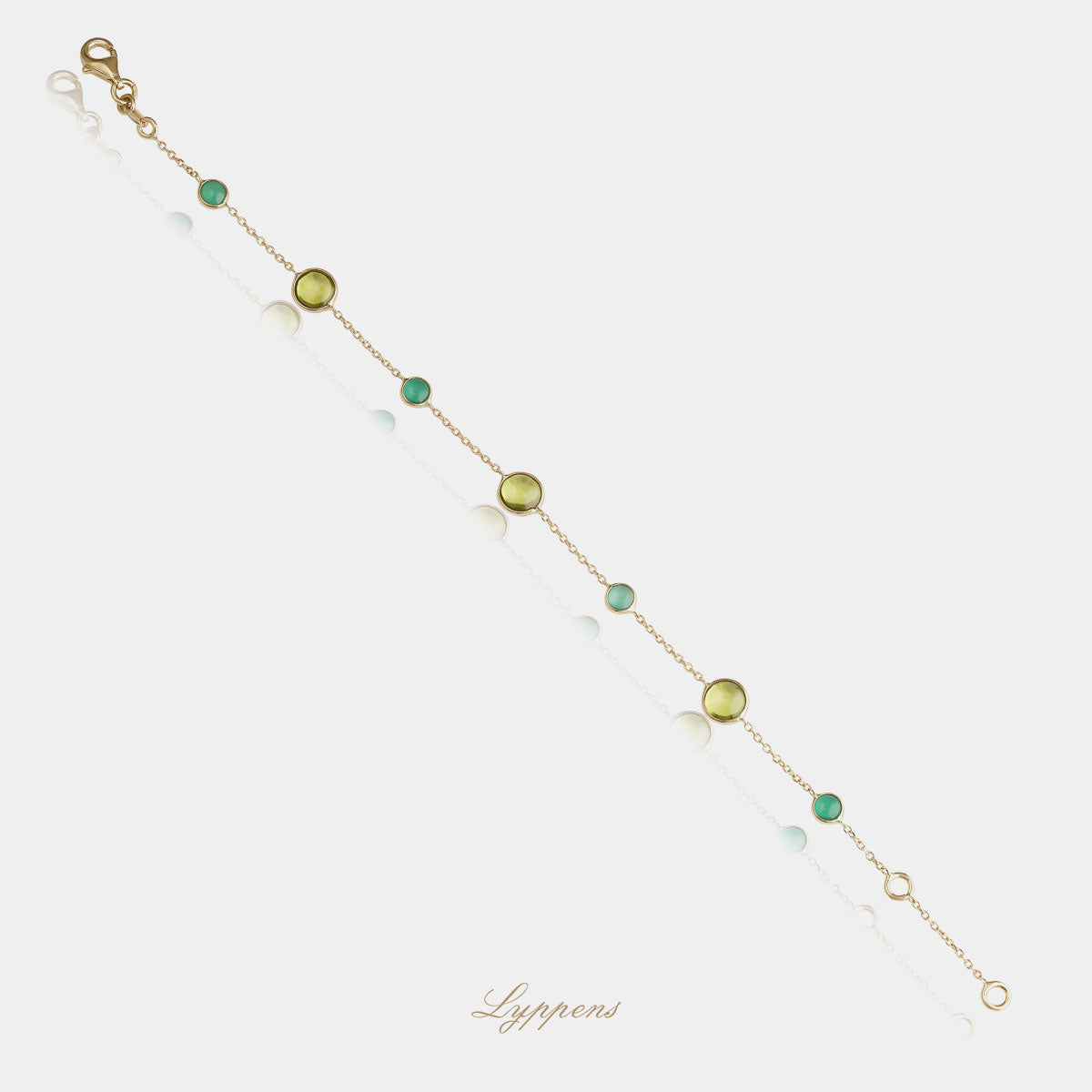 Yellow gold bracelet featuring peridot and agate