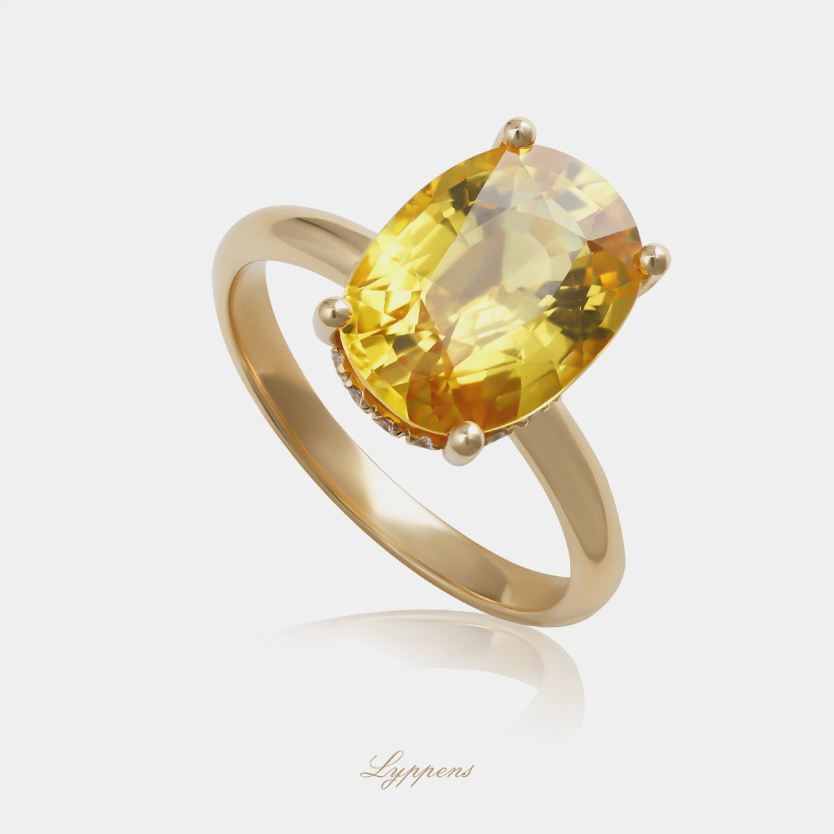 Yellow gold solitaire ring with yellow sapphire and white diamonds