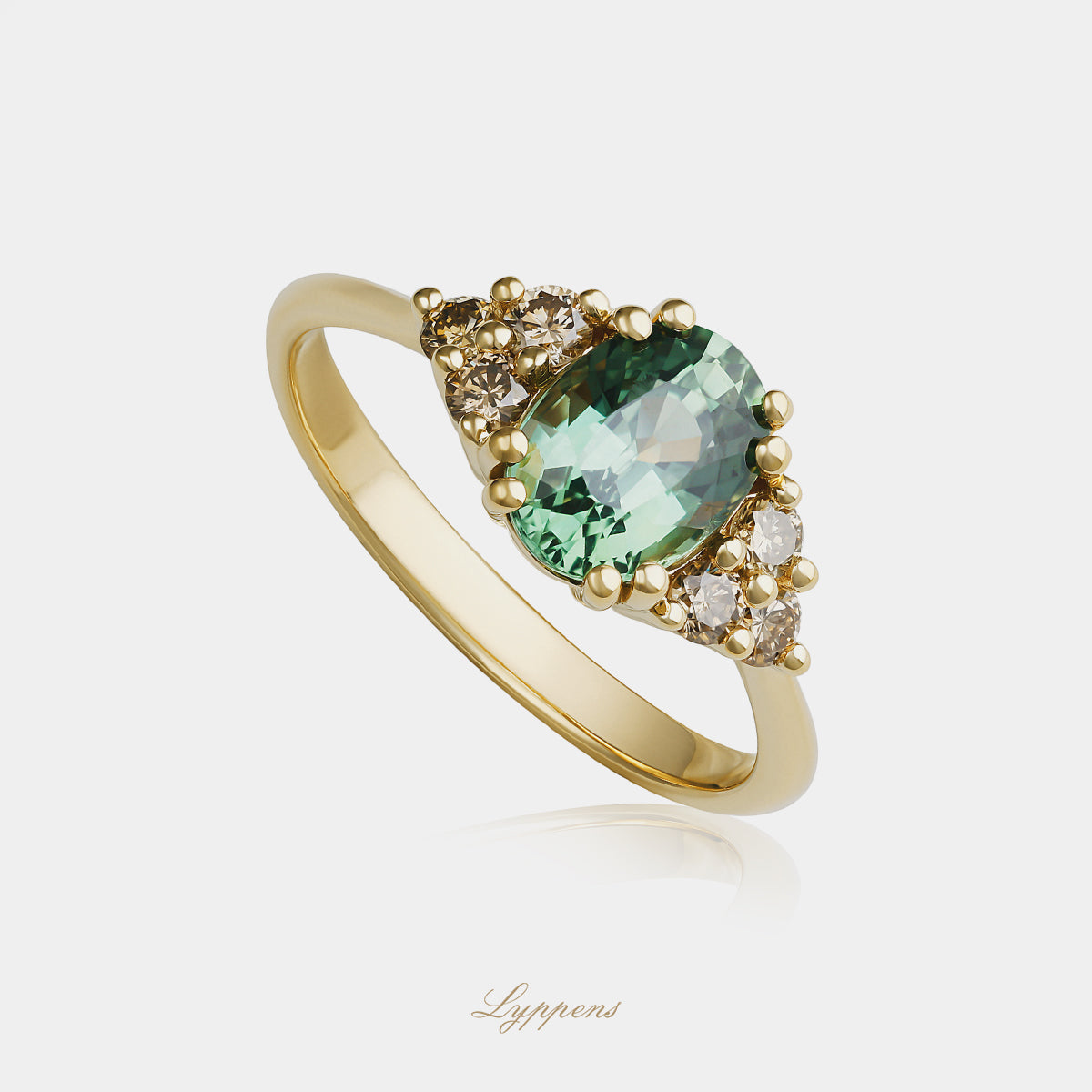 Geelgouden ring met groene saffier en bruine diamant