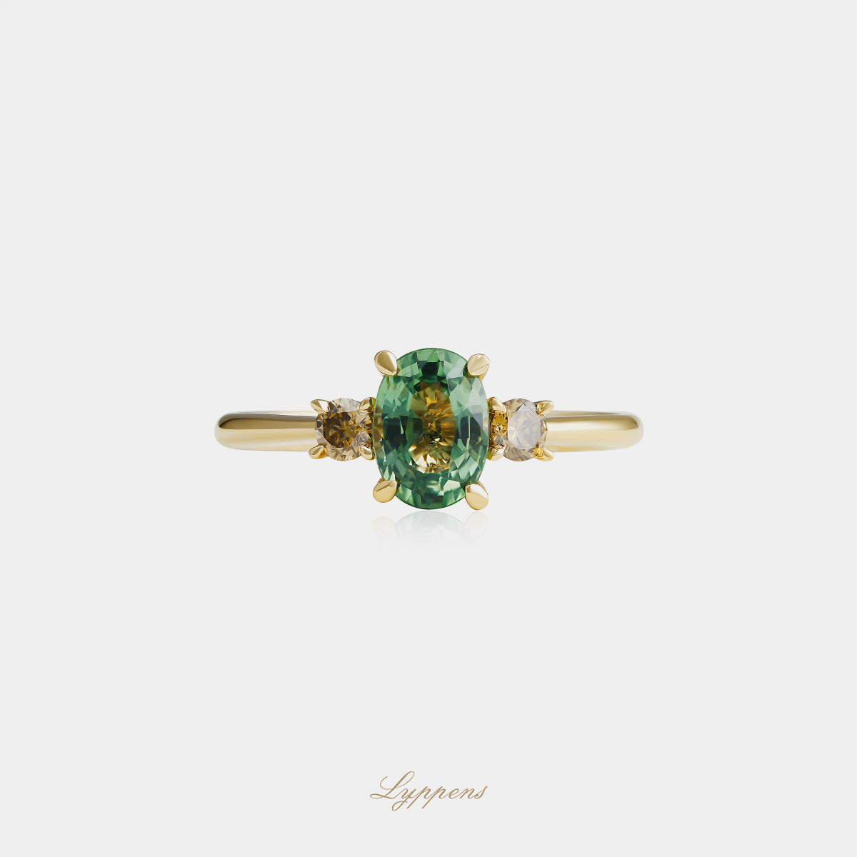 Geelgouden ring met groene saffier en bruine diamant