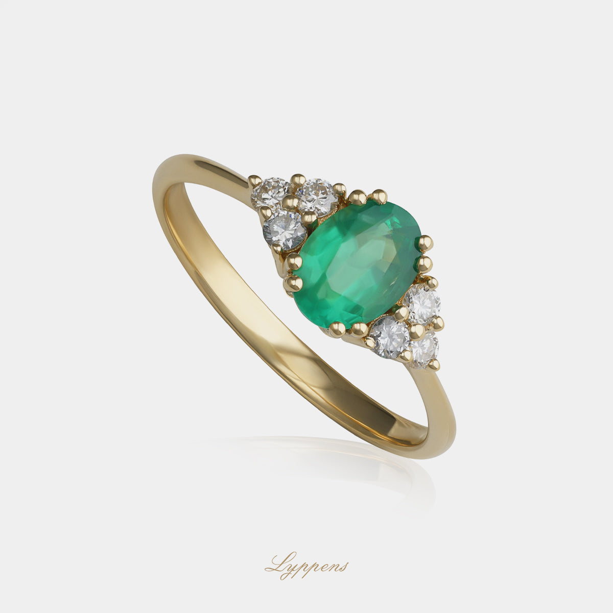 Geelgouden ring met smaragd en diamant