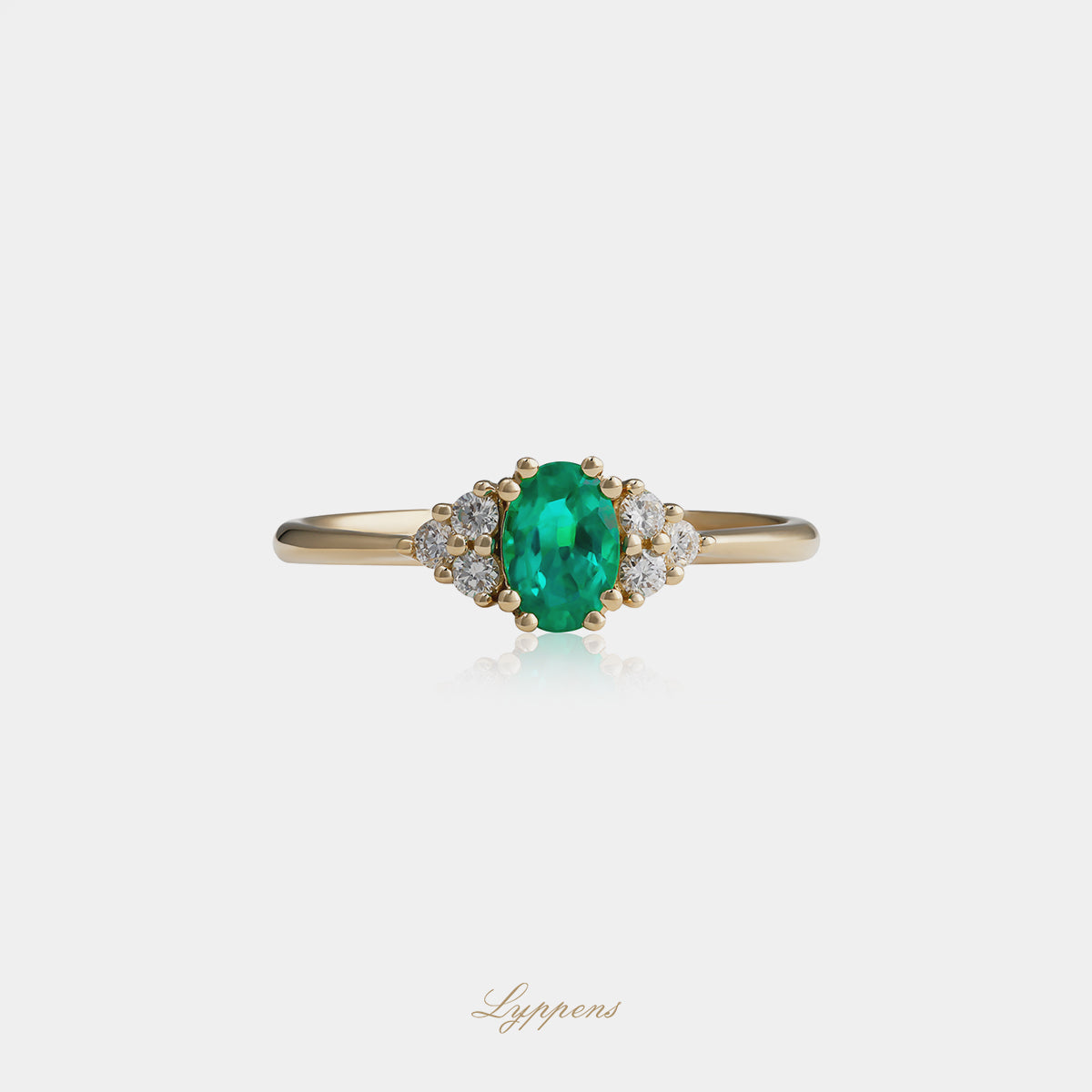 Geelgouden ring met smaragd en diamant